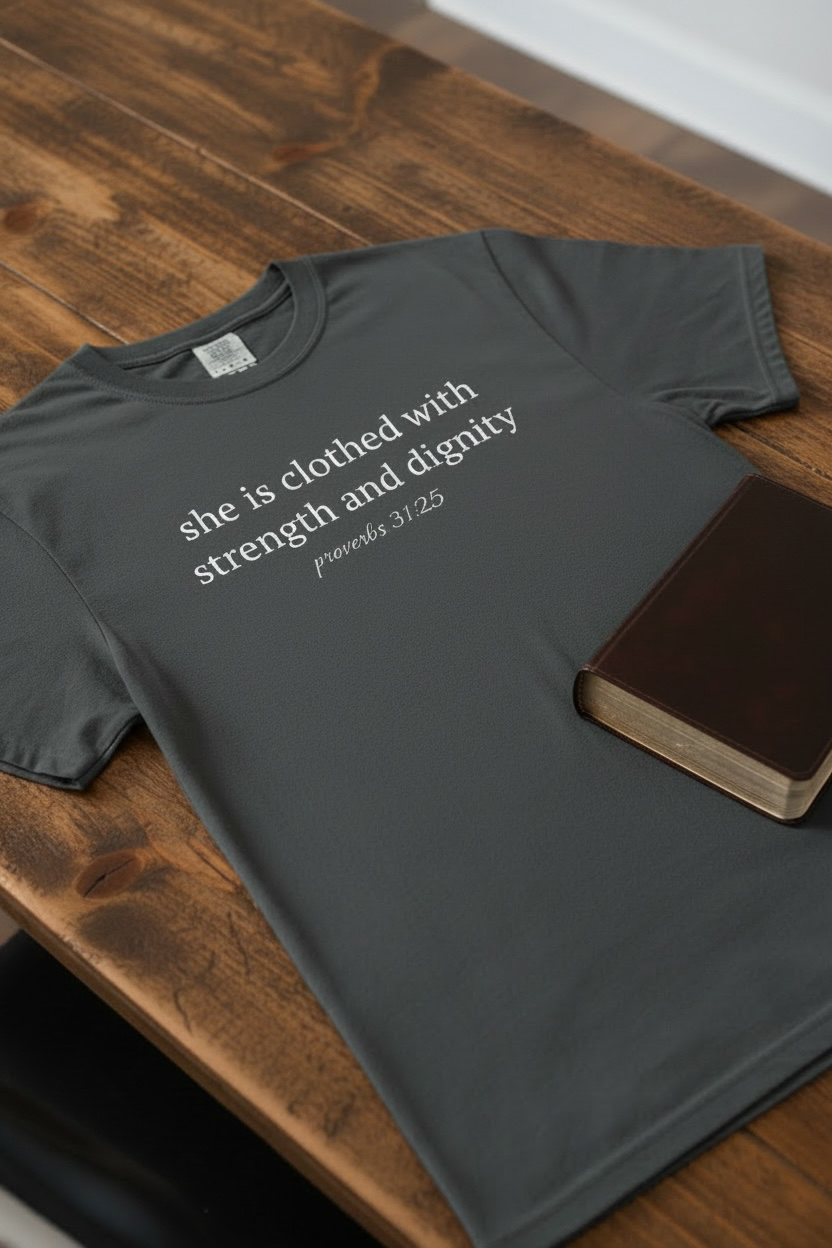 Biblical Verse T-Shirt — "She is clothed with strength and dignity" (Proverbs 31:25)